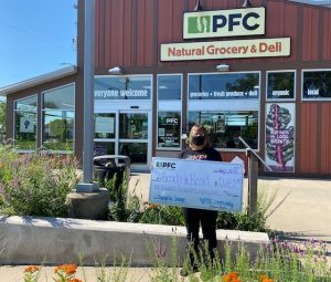 Jill Lansky receiving check from PFC