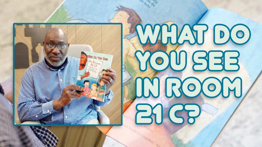 Background image of a children's book with a foreground image of Sid Ellis showing the book to the viewer with a title reading What Do You See in Room 21C?
